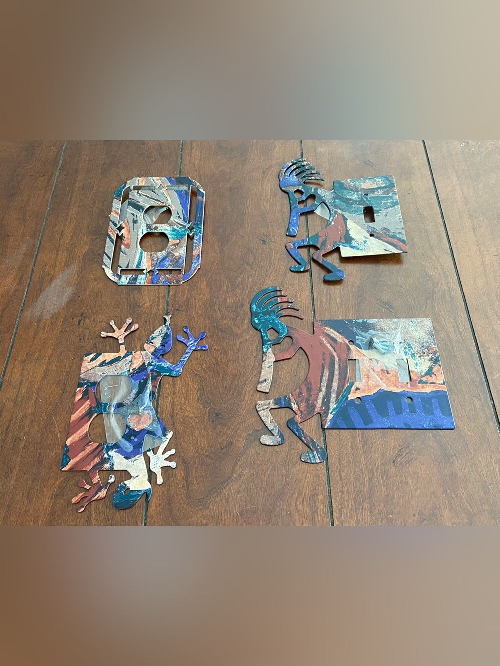 Handcrafted Metal Multicolor Kokopelli Wall Plates. Set of 4.